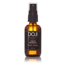 Load image into Gallery viewer, Doji natural deodorant, bottle product shot, fresh citrus scent, amber glass spray bottle, on white background with reflection.