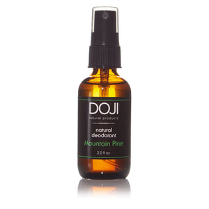 Doji natural deodorant, bottle product shot, mountain pine scent, amber glass spray bottle, on white background with reflection.